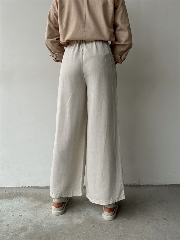 Keten Bağcık Detaylı Lastik Bel Geniş Paçalı Rosamunda Kadın Taş Pantolon 22Y000354